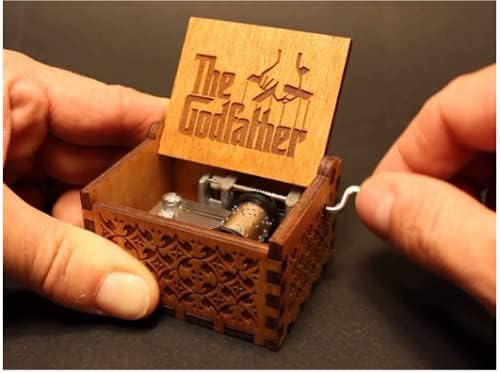 god father hand crank music box close up design detail
